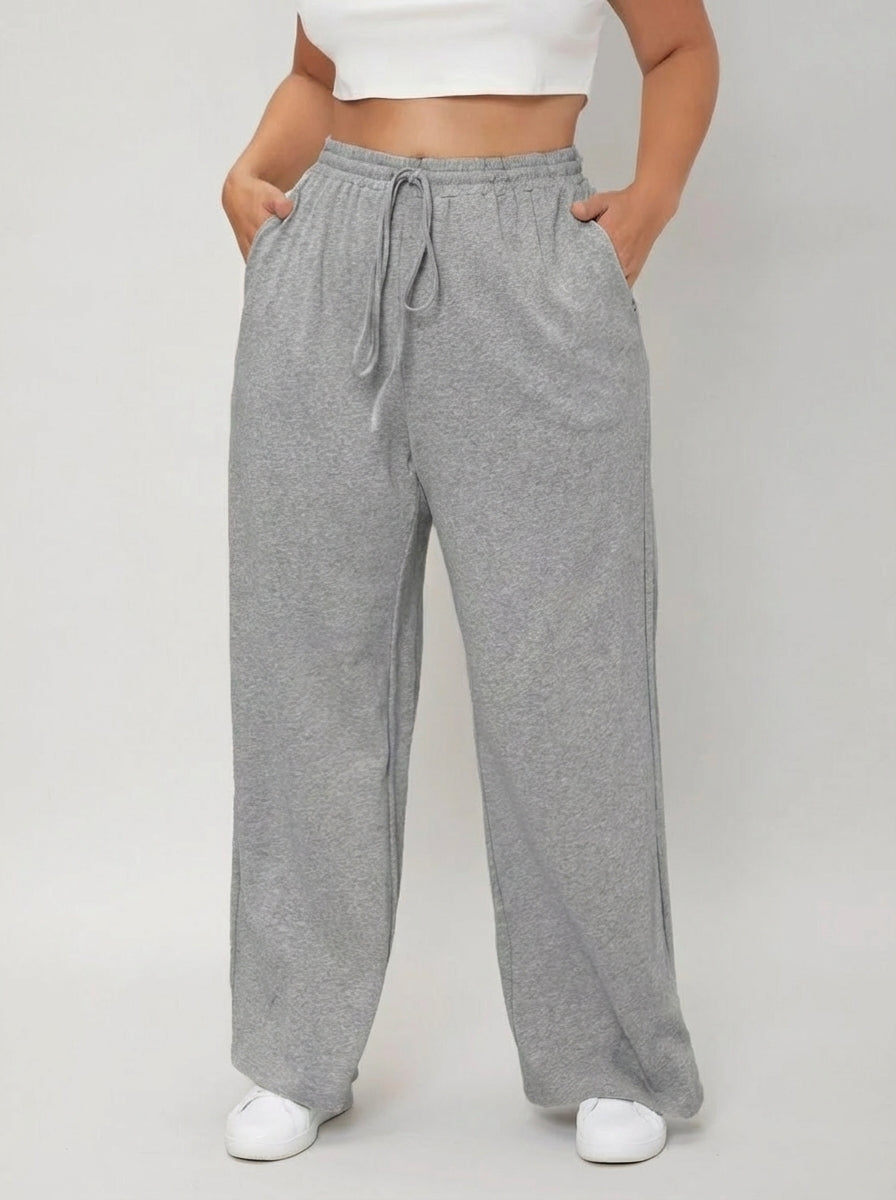 Calça plus size 100% algodão com cintura natural, cordão ajustável e caimento leve para o dia a dia