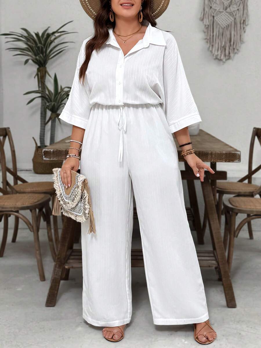 Realce suas curvas com este macacão plus size de manga morcego. Conforto, estilo casual e caimento solto para qualquer ocasião.