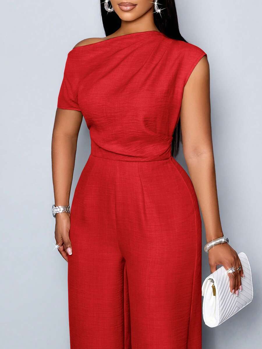 Combine conforto e elegância com macacão plus size ombro à mostra, cintura alta e design moderno para festas.