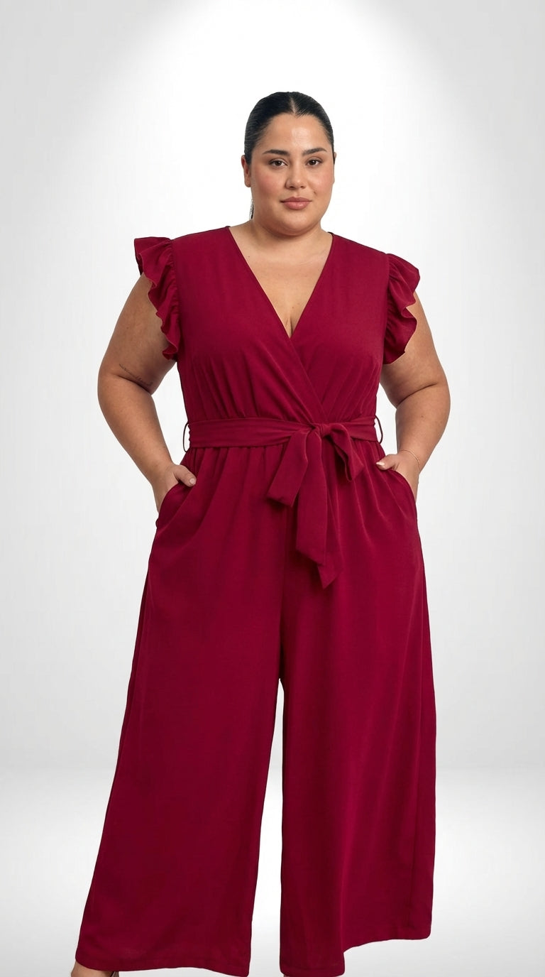 Macacão plus size vermelho com decote V pequeno, mangas bufantes e cintura alta
