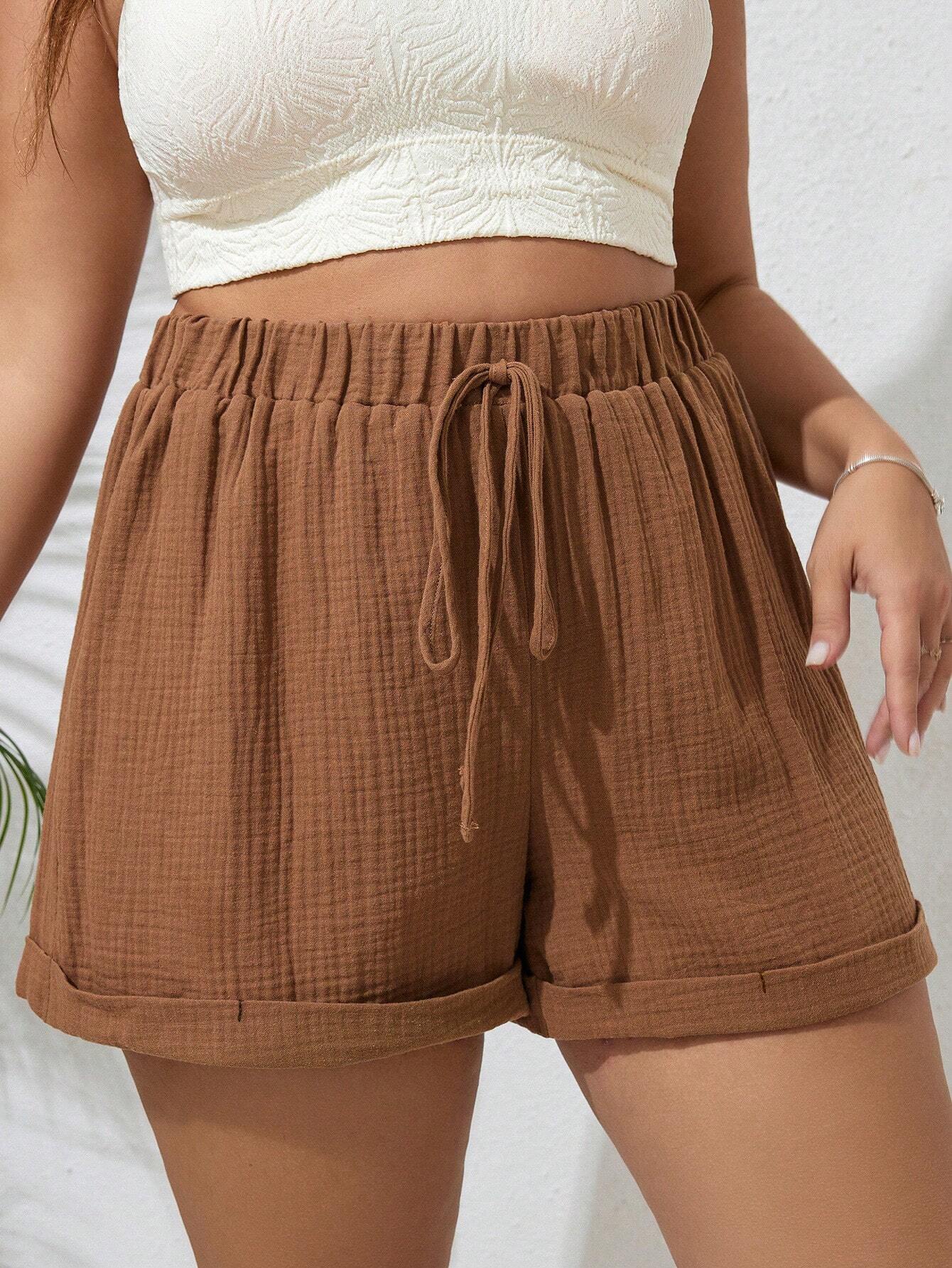 Short feminino marrom, em 100% algodão, caimento solto e confortável. Detalhe de nó charmoso, ideal para qualquer ocasião. Frete grátis para todo o Brasil.