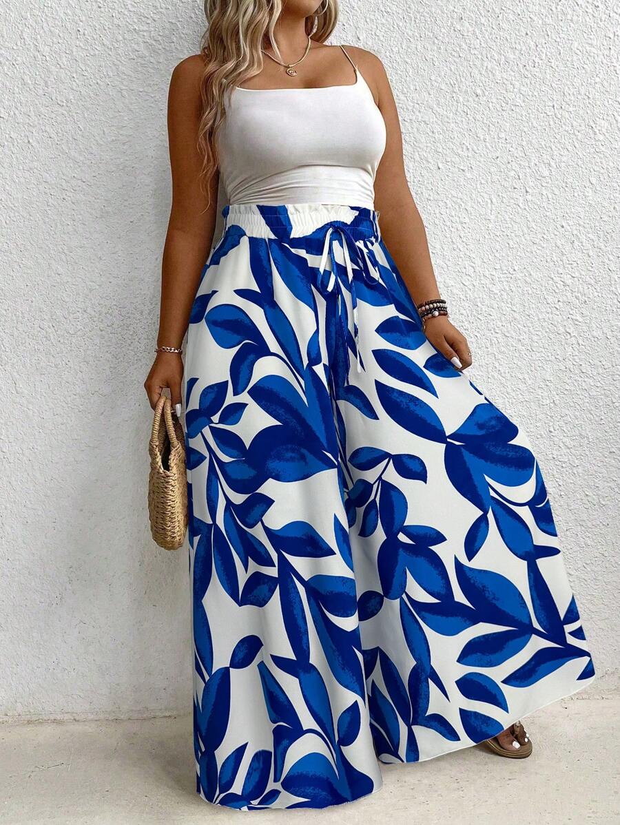 Calça Feminina Plus Size é ideal para mulheres que buscam elegância e conforto em uma única peça. Com modelagem de perna larga e cintura natural, valoriza a silhueta e oferece liberdade de movimento. Seu tecido leve e elástico proporciona um caimento solto e confortável.