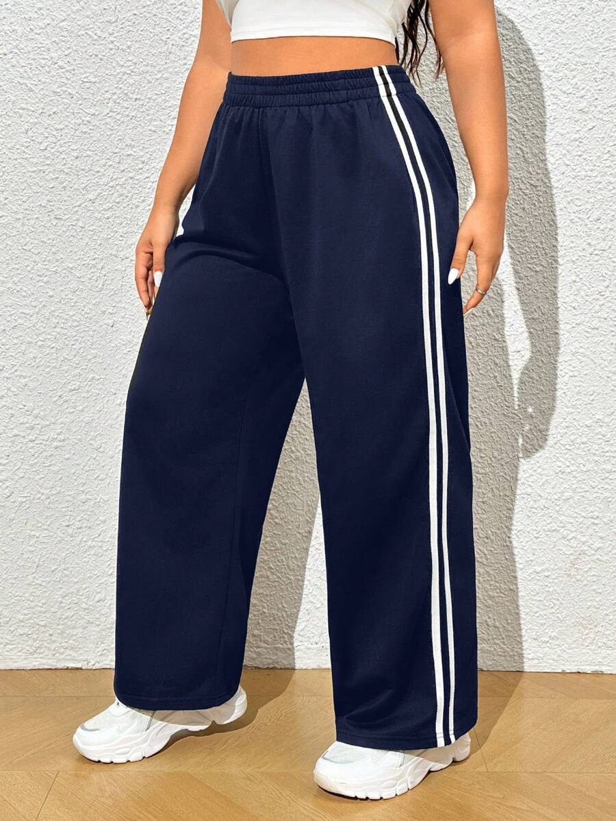 Ideal para o dia a dia, a calça moletom plus size tem cintura elástica, perna larga e tecido respirável. Estilo sem esforço!