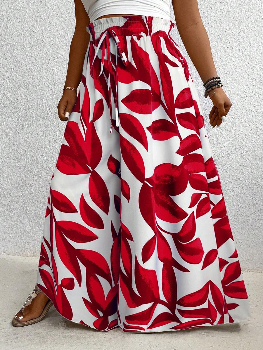 Calça Pantalona Feminina Floral é ideal para mulheres que buscam elegância e conforto em uma única peça. Com modelagem de perna larga e cintura natural, valoriza a silhueta e oferece liberdade de movimento. Seu tecido leve e elástico proporciona um caimento solto e confortável.
