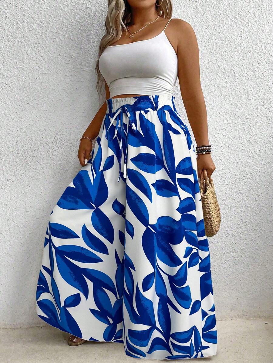 Calça Pantalona Floral é ideal para mulheres que buscam elegância e conforto em uma única peça. Com modelagem de perna larga e cintura natural, valoriza a silhueta e oferece liberdade de movimento. Seu tecido leve e elástico proporciona um caimento solto e confortável.