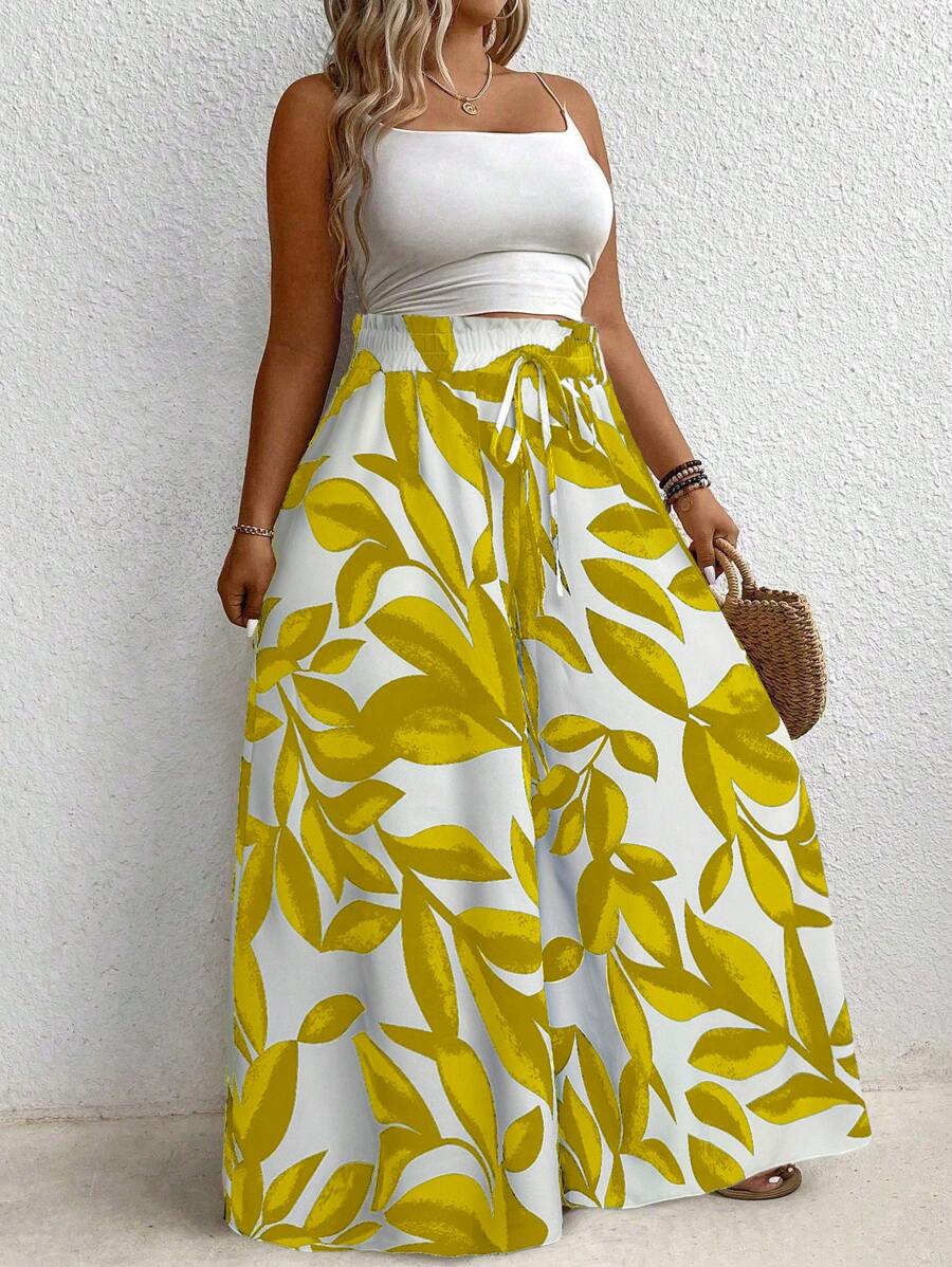 Calça Pantalona Plus Size Amarela é ideal para mulheres que buscam elegância e conforto em uma única peça. Com modelagem de perna larga e cintura natural, valoriza a silhueta e oferece liberdade de movimento. Seu tecido leve e elástico proporciona um caimento solto e confortável.