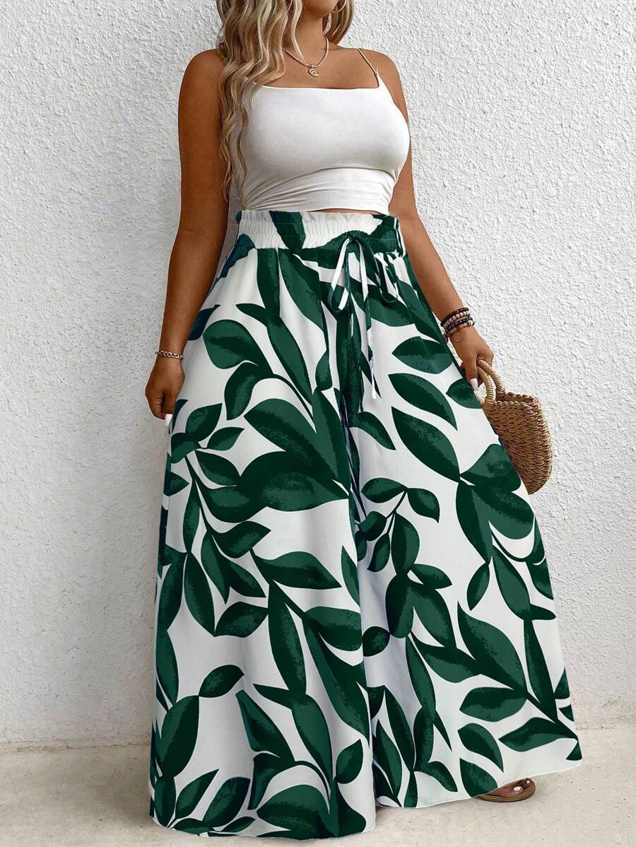 Calça Pantalona Plus Size Confortável é ideal para mulheres que buscam elegância e conforto em uma única peça. Com modelagem de perna larga e cintura natural, valoriza a silhueta e oferece liberdade de movimento. Seu tecido leve e elástico proporciona um caimento solto e confortável.