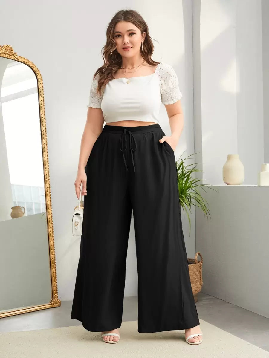 Tecido de viscose e poliéster, caimento solto e toque macio para looks do trabalho ao lazer.