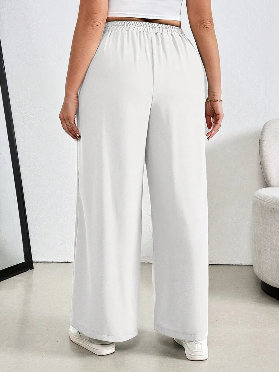 Calça Pantalona Plus Size Linho Casual e Sofisticada para o Dia a Dia, com cintura alta que valoriza as curvas e alonga a silhueta. Possui caimento fluido, toque macio e elasticidade que garante conforto durante todo o dia
