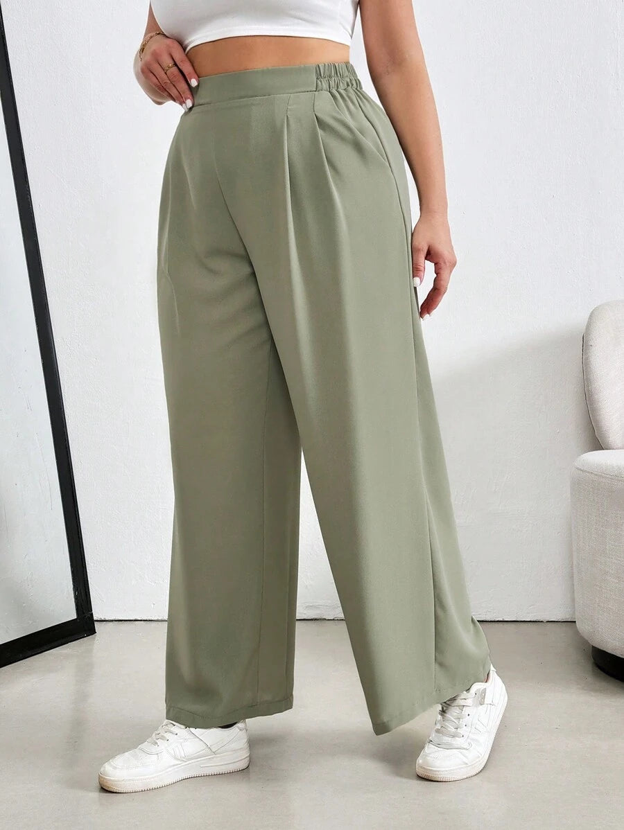 Calça Pantalona com Bolsos Dobrados confeccionada em 100% linho de alta qualidade, com cintura alta que valoriza as curvas e alonga a silhueta. Possui caimento fluido, toque macio e elasticidade que garante conforto durante todo o dia.