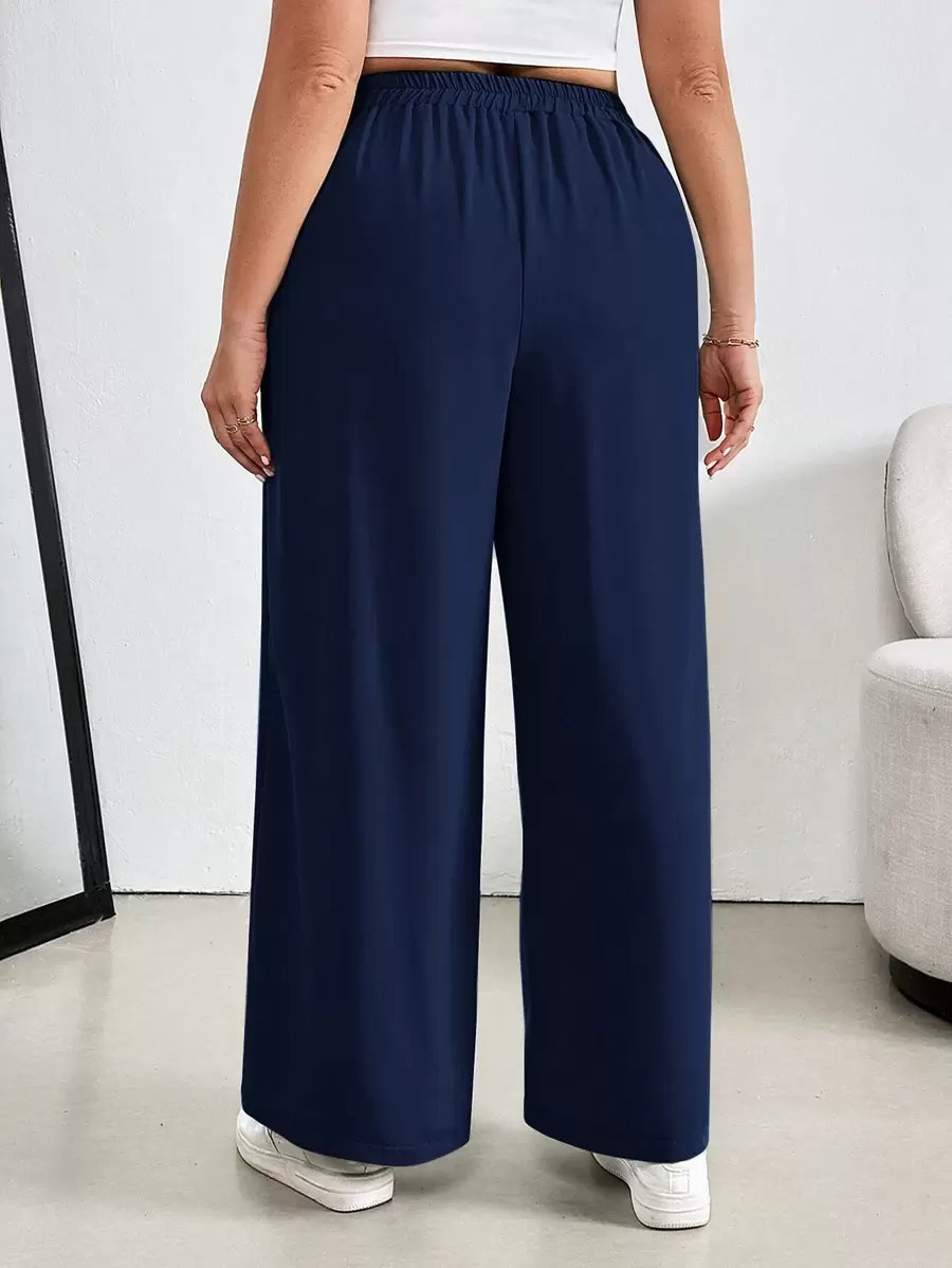 Calça Pantalona para Mulheres Plus Size confeccionada em 100% linho de alta qualidade, com cintura alta que valoriza as curvas e alonga a silhueta. Possui caimento fluido, toque macio e elasticidade que garante conforto durante todo o dia.