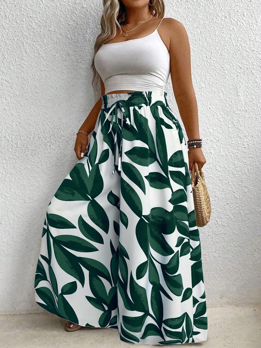 Calça plus size com bolso é ideal para mulheres que buscam elegância e conforto em uma única peça. Com modelagem de perna larga e cintura natural, valoriza a silhueta e oferece liberdade de movimento. Seu tecido leve e elástico proporciona um caimento solto e confortável.