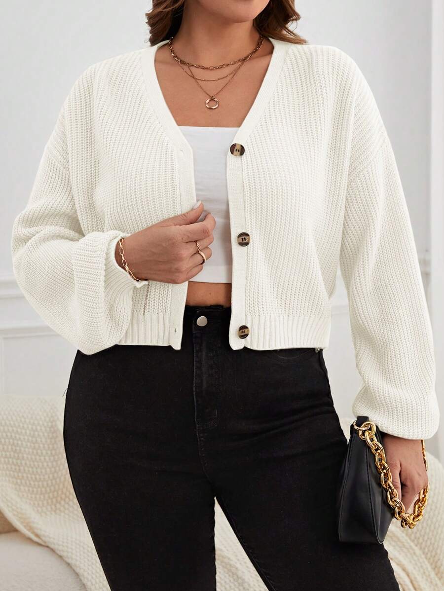 Cardigan Plus Size casual com botões frontais. Perfeito para trabalho, lazer ou encontros sociais.