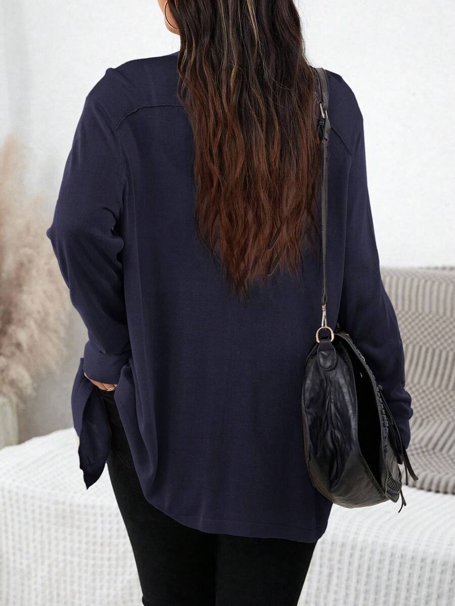 Estilo e conforto em uma só peça. Cardigan de malha plus size com caimento perfeito.