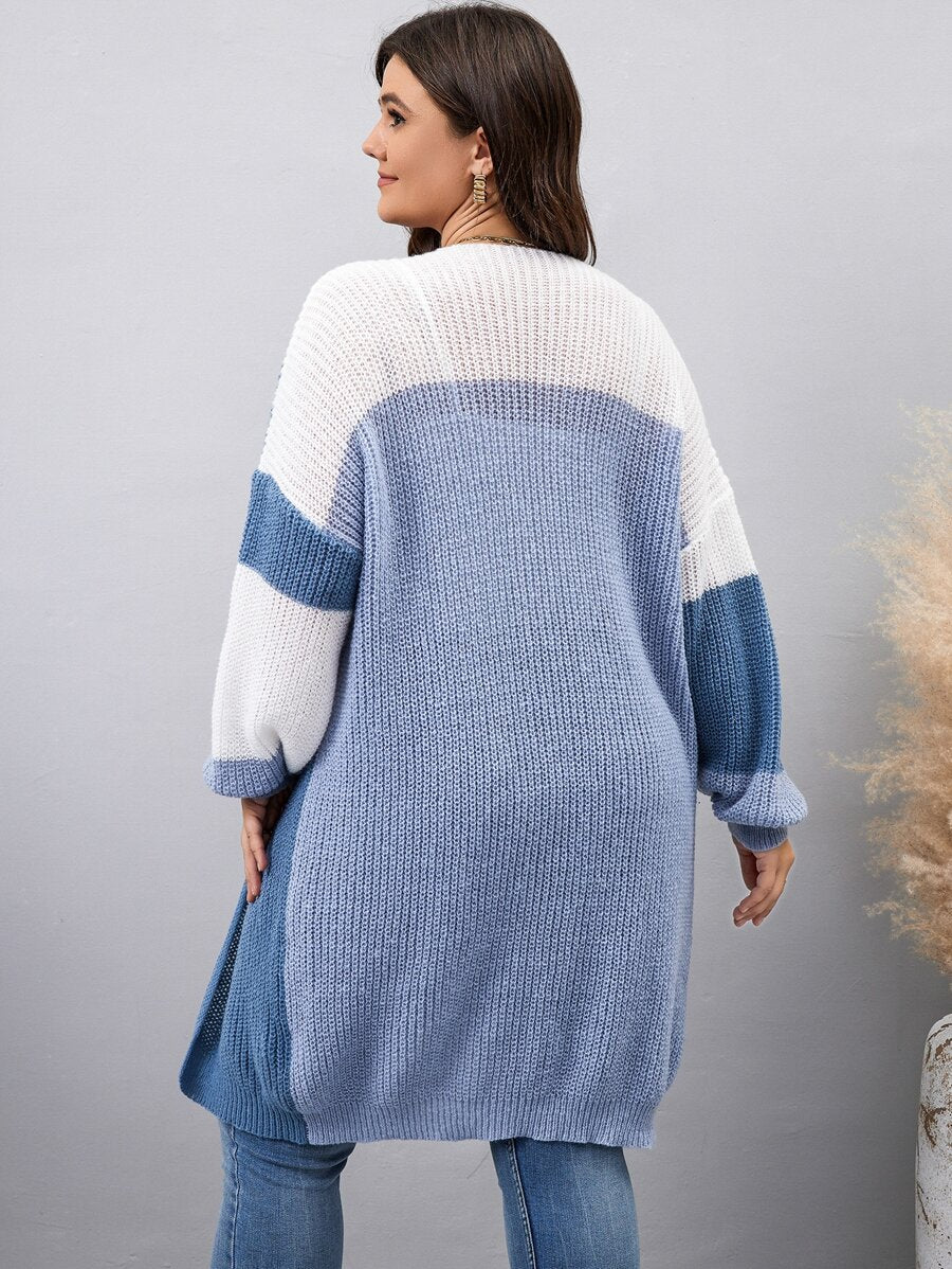 Cardigan feminino plus size longo, feito em lã penteada. Conforto, estilo e praticidade para seu dia a dia. Estoque limitado!