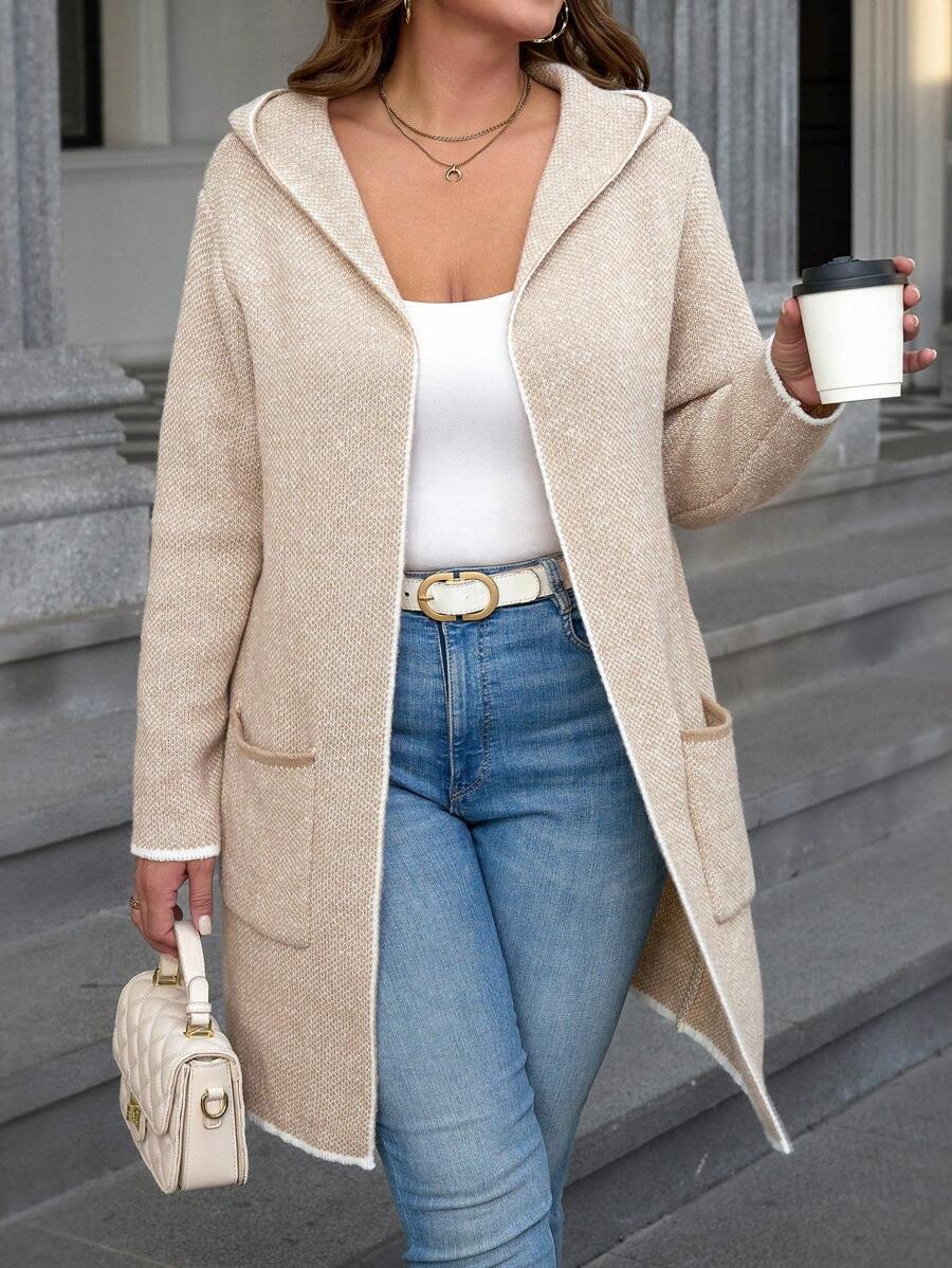 Cardigan plus size longo em algodão, com capuz e bolsos. Estilo casual e conforto para o dia a dia. Garanta já o seu!