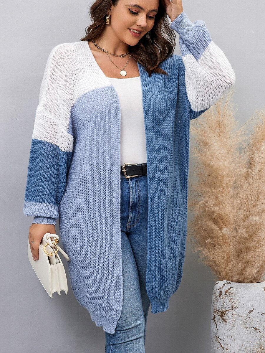 Cardigan plus size de manga comprida, tecido de elasticidade média. Perfeito para qualquer ocasião, fácil de combinar e manter.