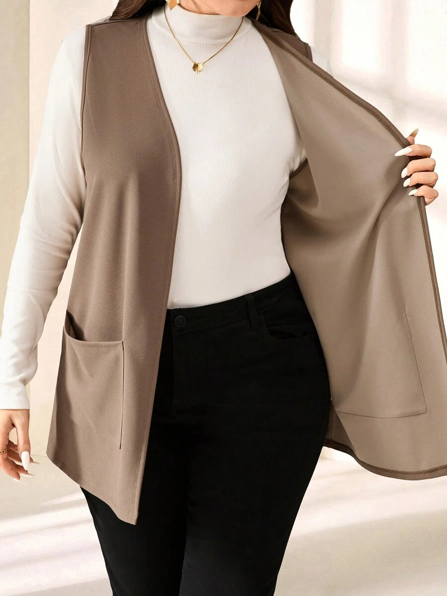 Colete plus size versátil, tecido macio e caimento perfeito para valorizar o corpo.