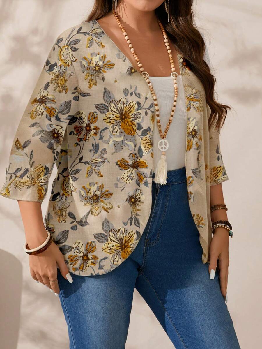 Estilo e conforto em uma jaqueta plus size casual 3/4. Design floral e assimétrico que valoriza a silhueta feminina.
