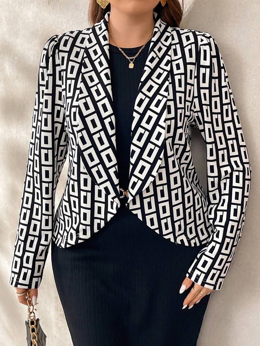 Jaqueta plus size elegante com manga bufante e gola de xale. Peça versátil que combina conforto e sofisticação para qualquer ocasião.