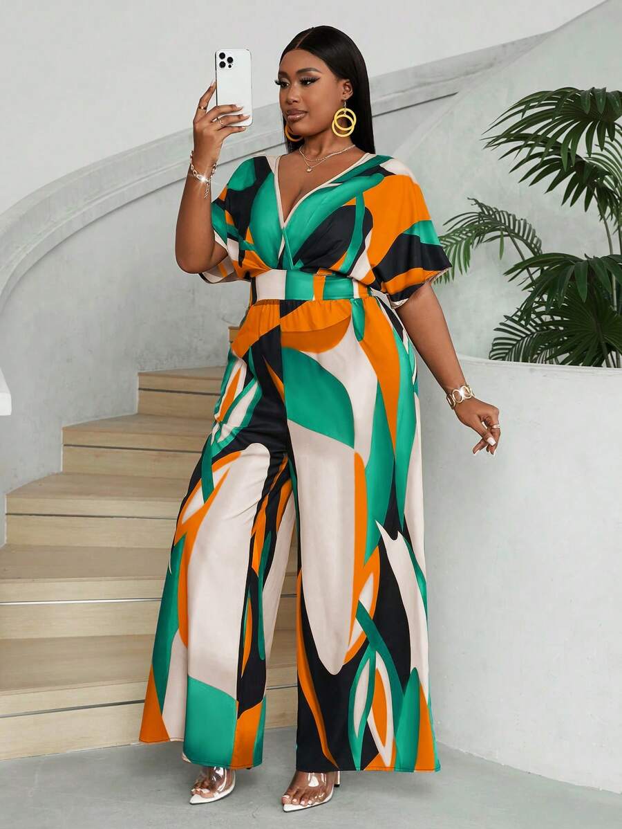 Design sofisticado que alonga a silhueta. Macacão plus size longo com gola V profunda e cintura alta.