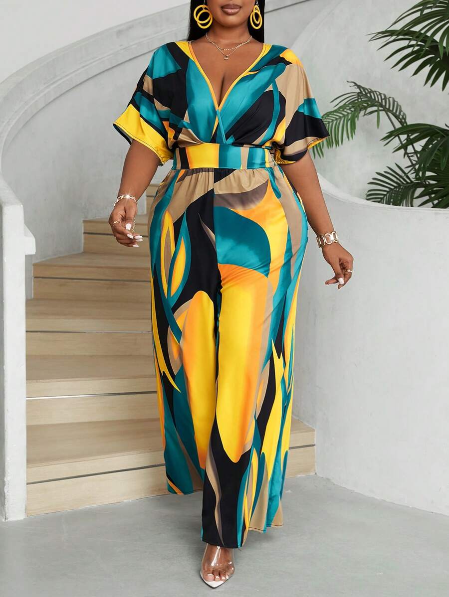 Descubra o macacão plus size longo com gola V profunda, manga morcego e caimento solto. Sofisticação em qualquer ocasião.