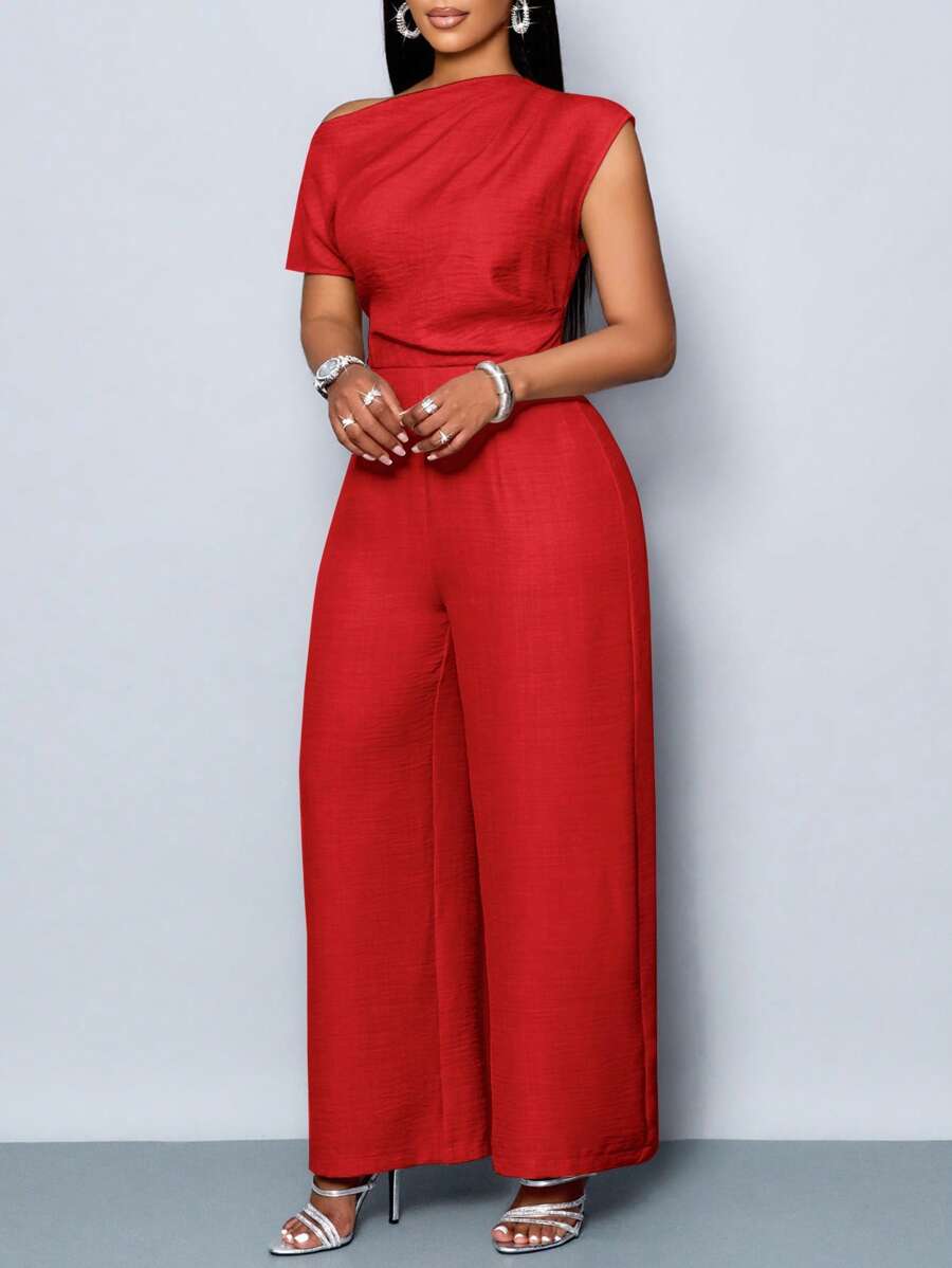 Valorize suas curvas com macacão plus size ombro à mostra, tecido macio e durável, perfeito para qualquer evento.