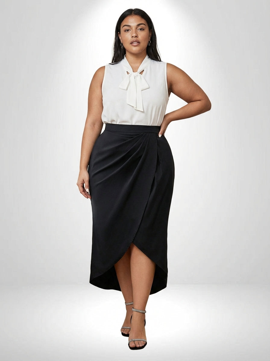 Saia plus size preta com modelagem elegante, efeito enrugado e visual versátil para ocasiões casuais e formais