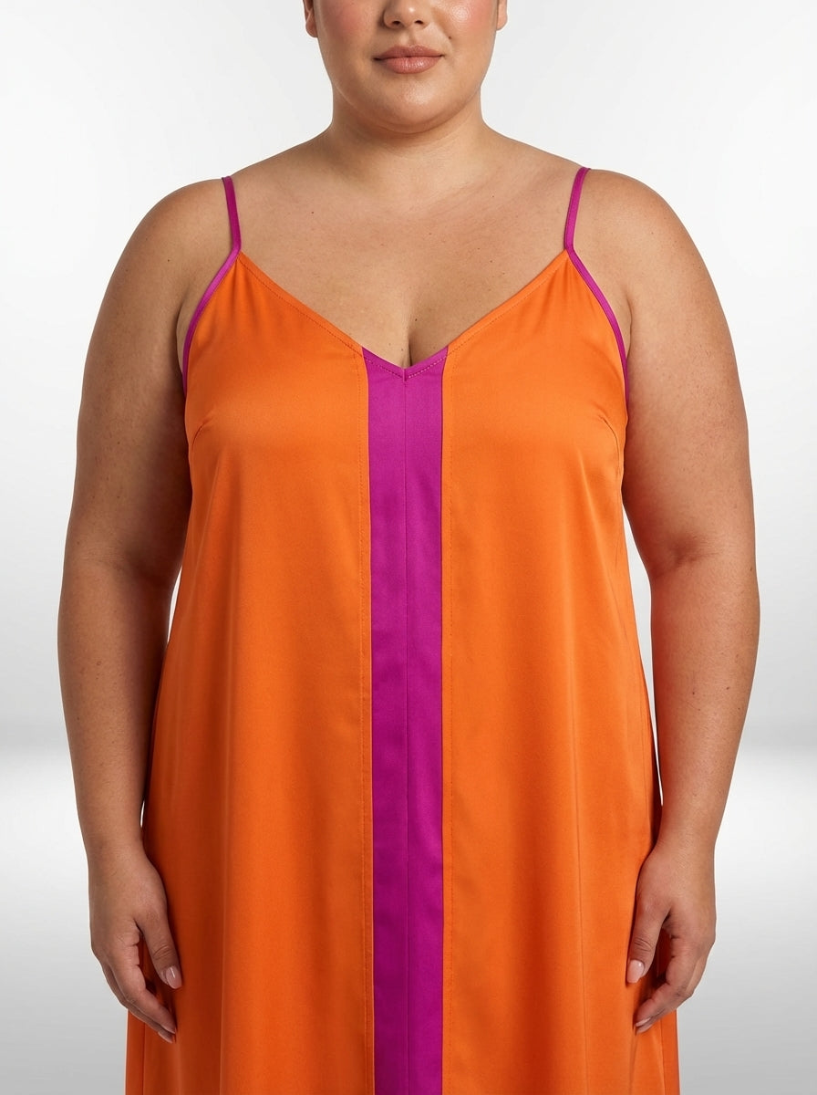 Vestido plus size com caimento solto, bainha flared e modelagem confortável para o dia a dia