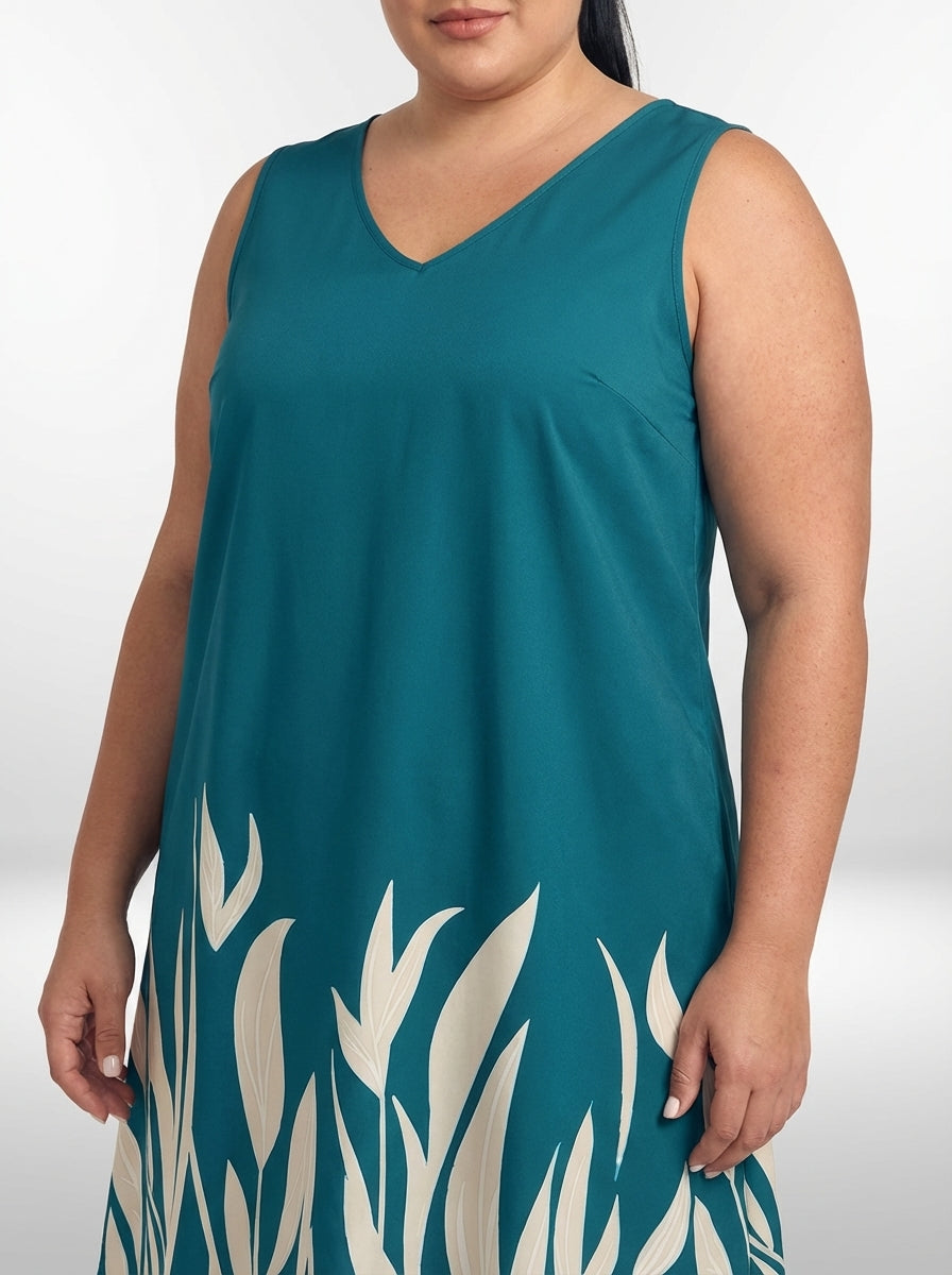 Vestido plus size azul petróleo com mangas flare, estampa de plantas e comprimento médio
