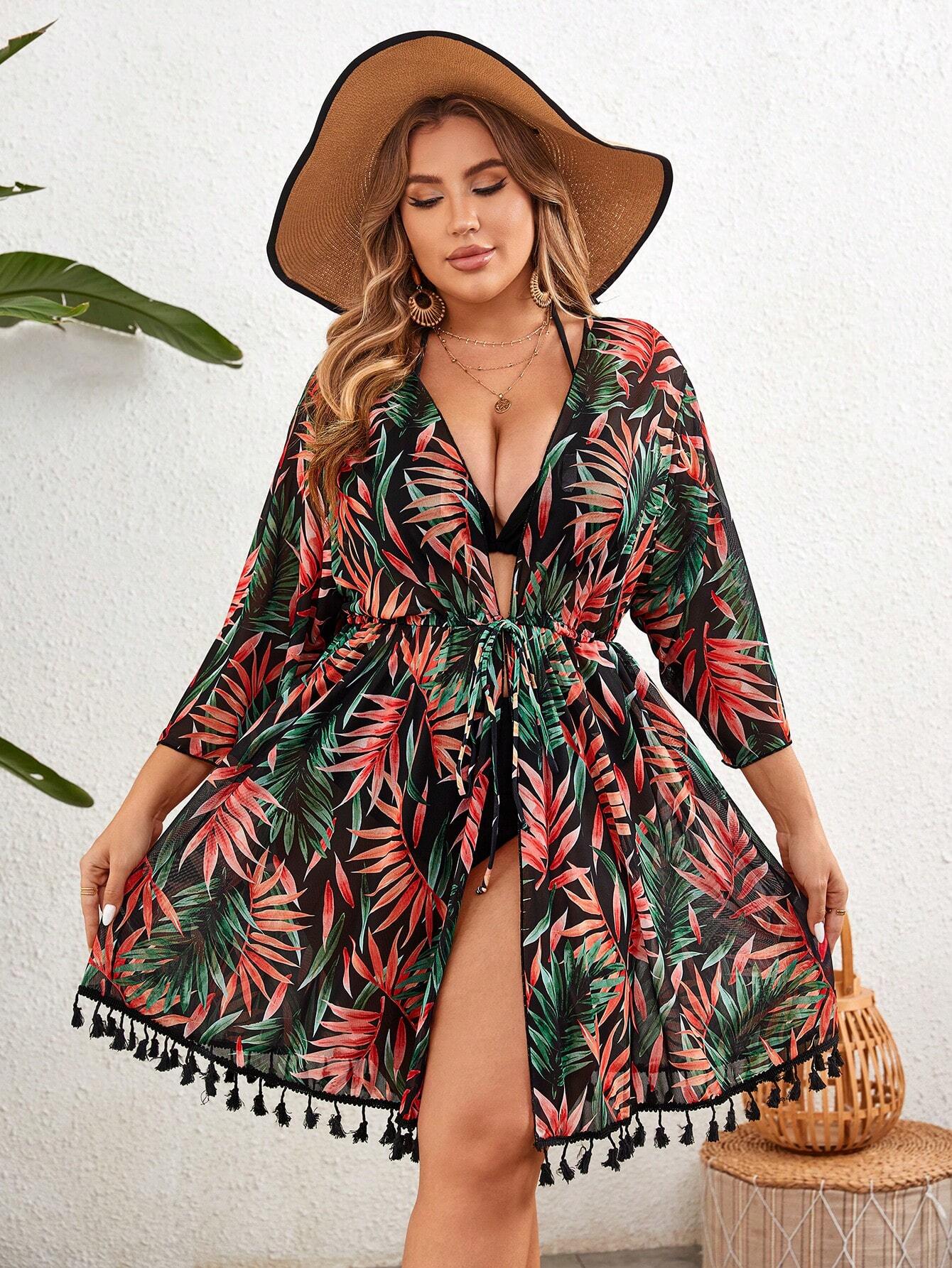 Saída de praia com estampa de flores, manga morcego, tecido elástico e caimento solto. Conforto, estilo e modernidade para dias de sol.